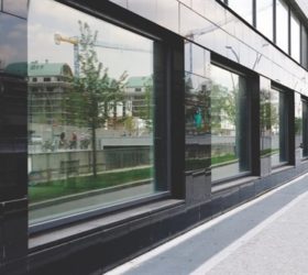Clean Black Building With Glass Panels